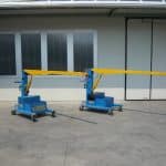 Electric crane for handling molds in the tire production sector.