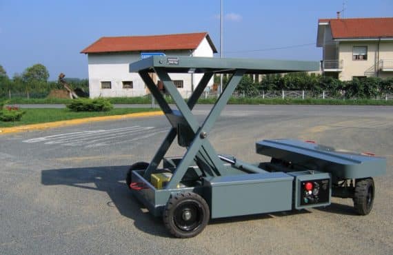 Radio-controlled trolley for handling industrial materials.