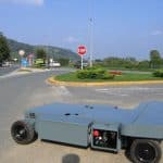 Radio-controlled trolley for handling industrial materials.